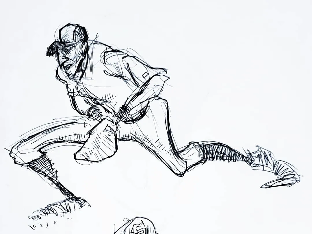 Second baseman fielding a sharply hit ground ball.