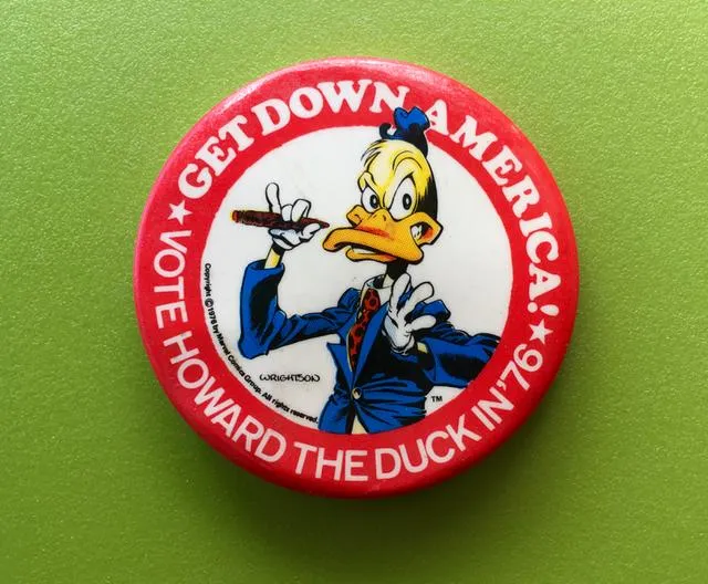 A picture of the Howard the Duck For President pin from 1976.